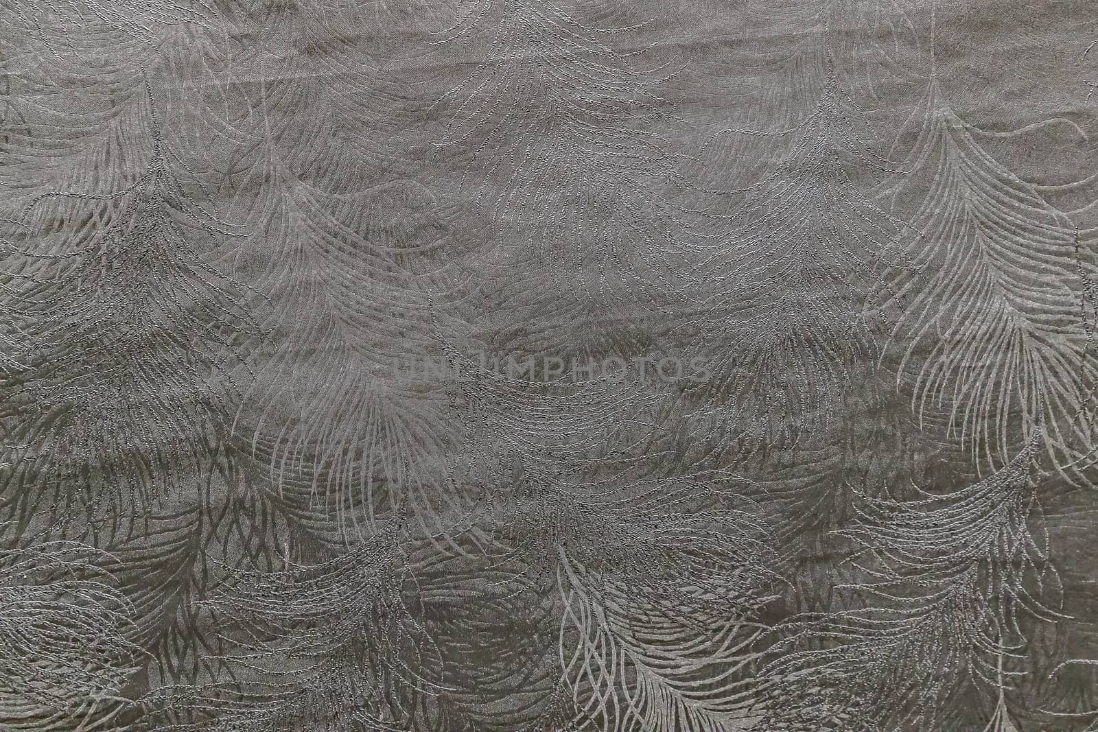 Taupe abstract grungy decorative texture. Textured paper with copy space. Motley gray paper surface, texture closeup.