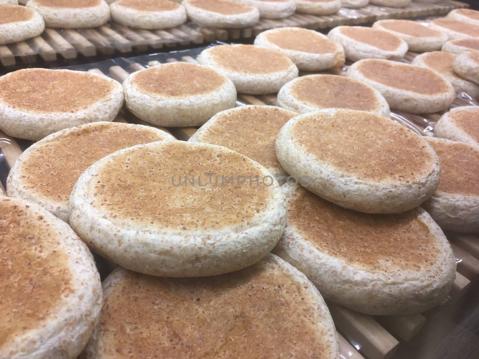 Delicious bakery pastries on trays in stores