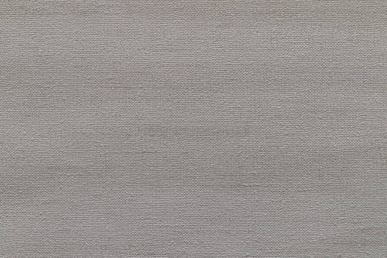 Taupe abstract grungy decorative texture. Textured paper with copy space. Motley gray paper surface, texture closeup.