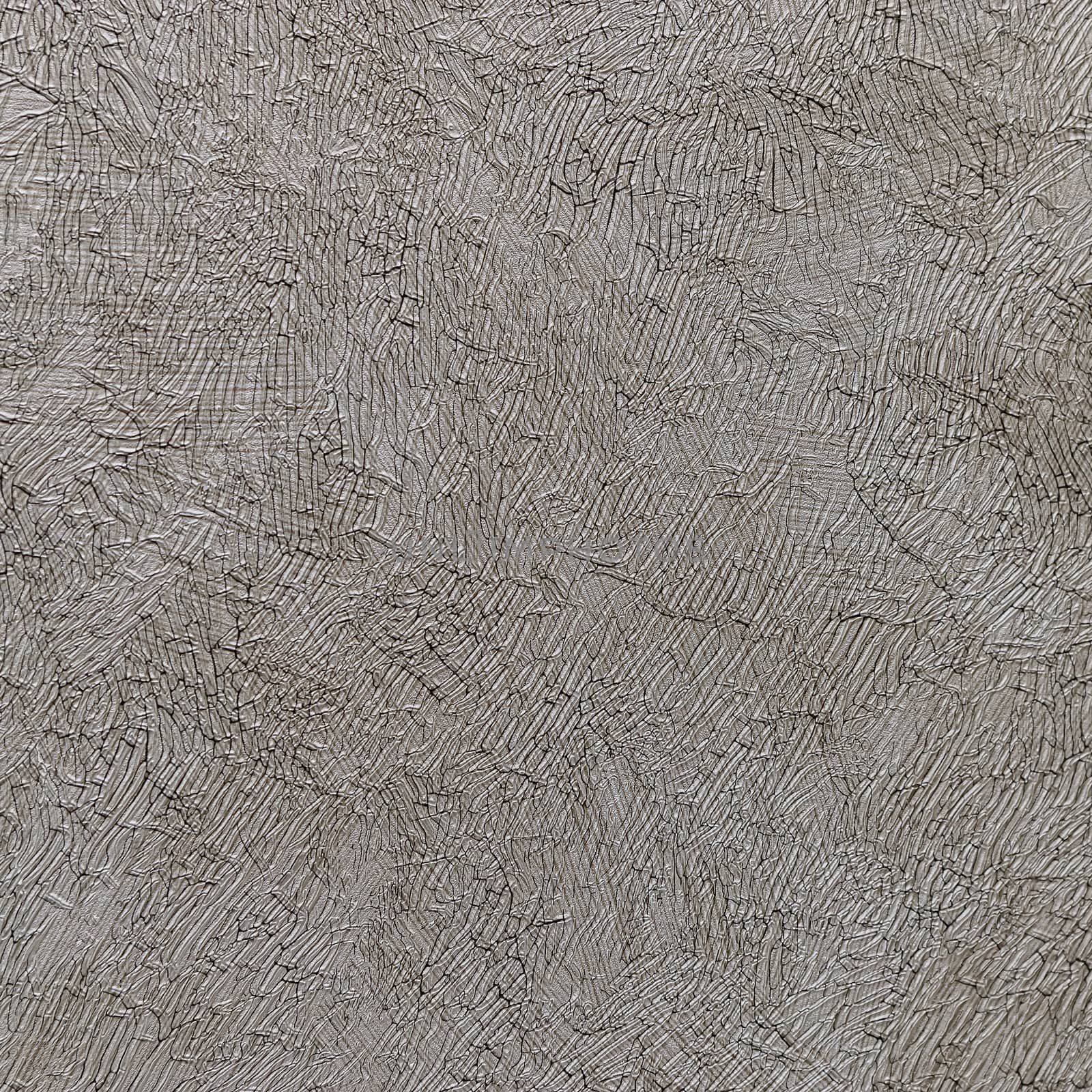 Taupe abstract grungy decorative texture. Textured paper with copy space. Motley gray-brown paper surface, texture closeup.