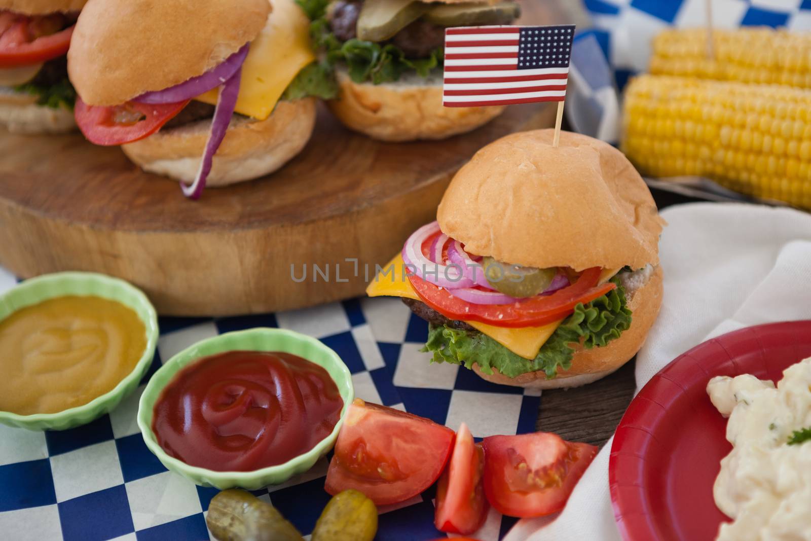 Hamburger decorated with 4th july theme on table