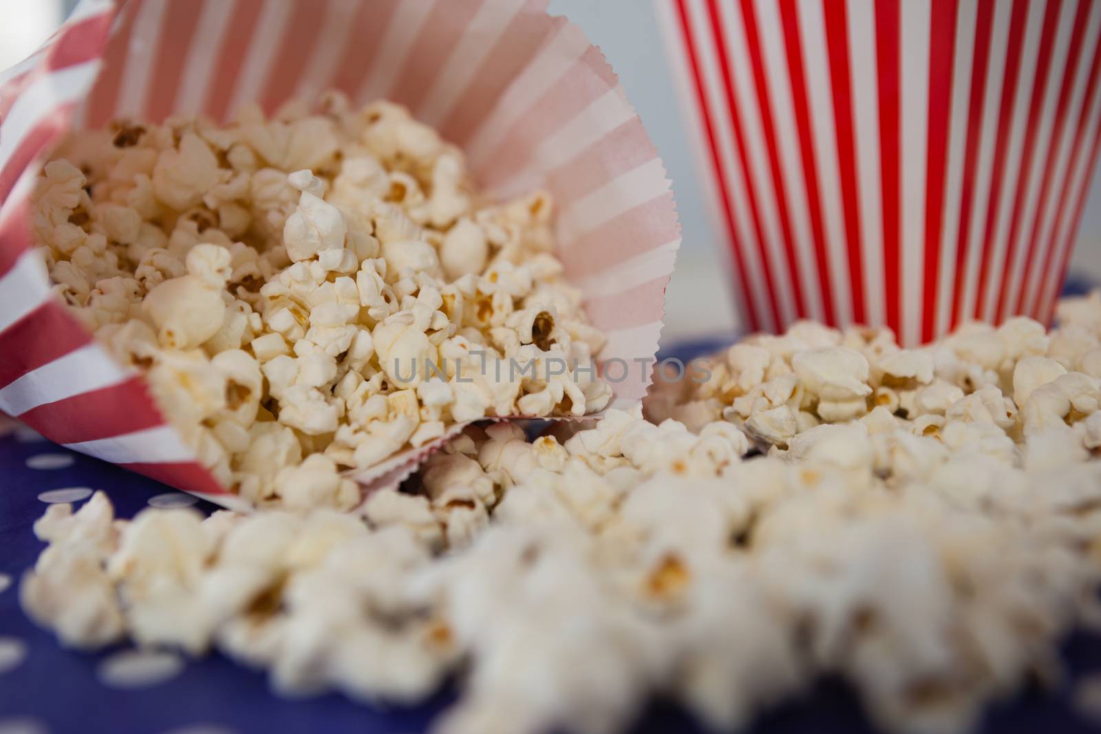 Close-up of scattered popcorn with 4th july theme