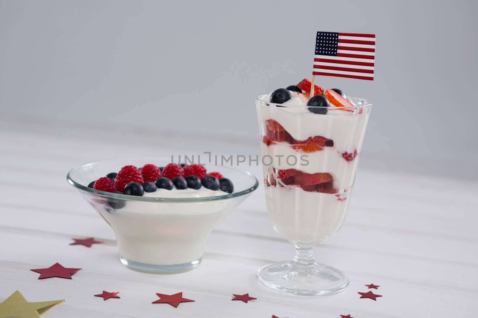 Fruit ice cream with 4th july theme on wooden table
