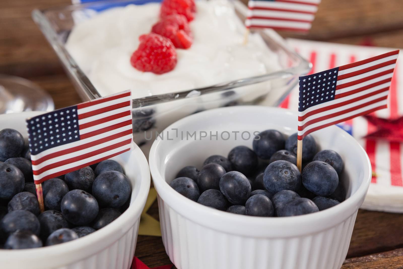 Blueberries in bowl with 4th july theme by Wavebreakmedia