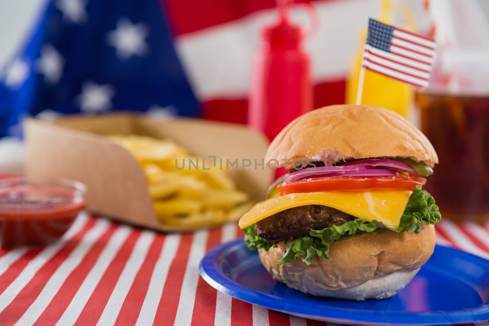 Burger decorated with 4th july theme by Wavebreakmedia