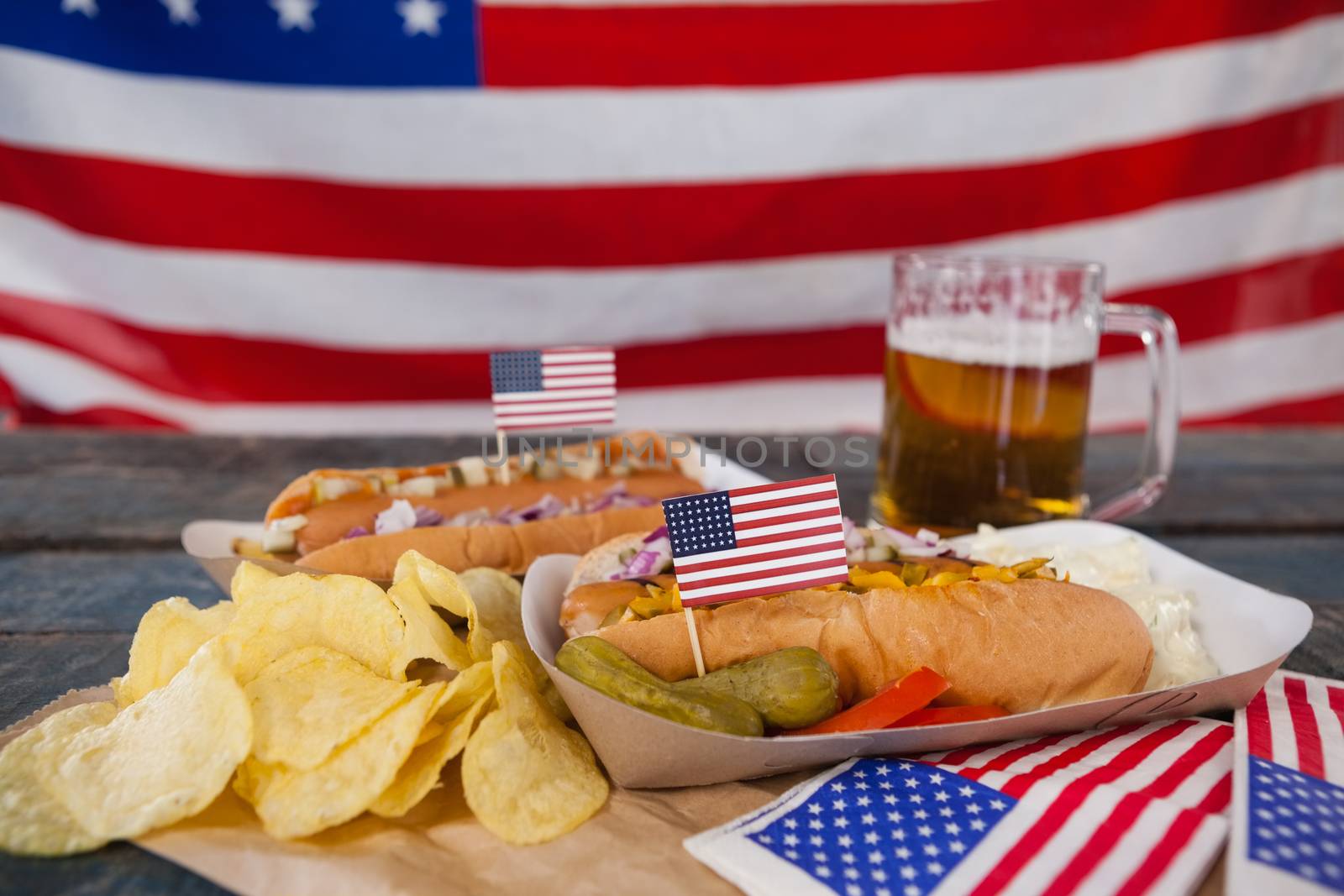 Snacks and drink decorated with 4th july theme by Wavebreakmedia