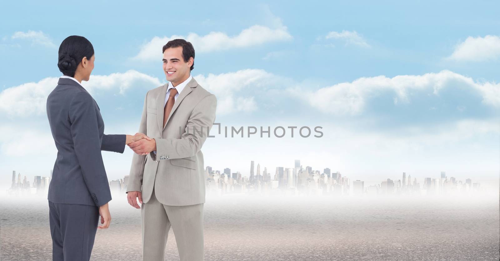Digital composite of business people in cityscape