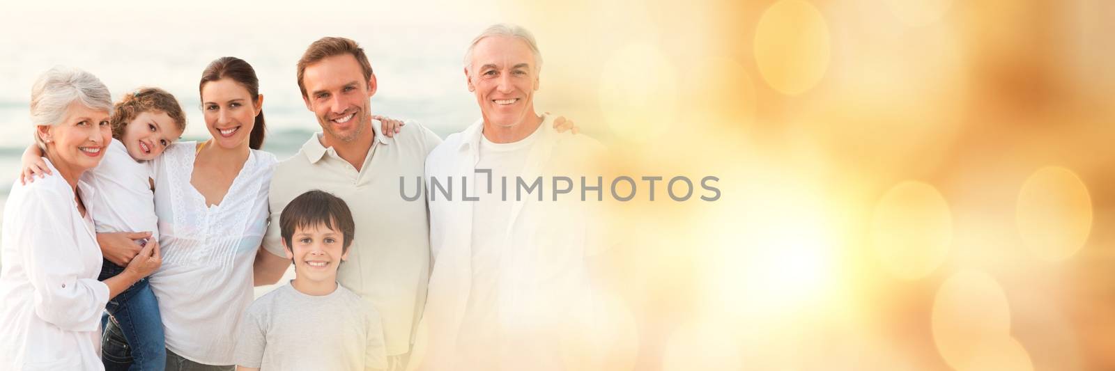 Digital composite of Family at beach with yellow bokeh transition