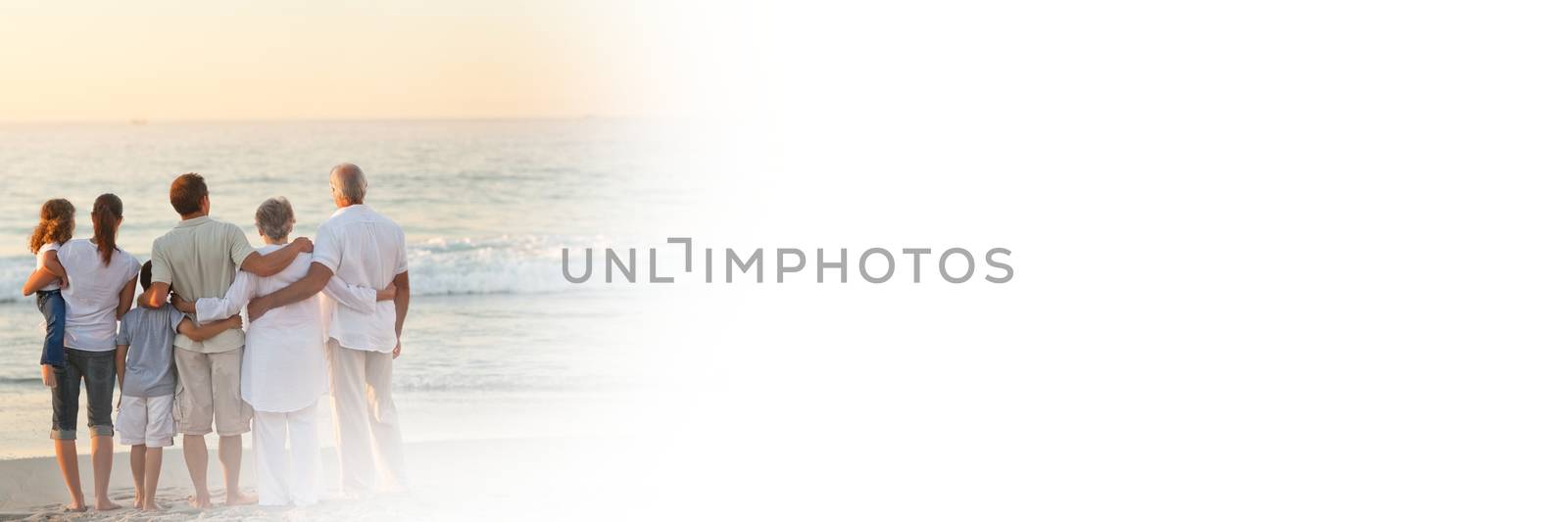 Digital composite of Back of family at beach with white transition