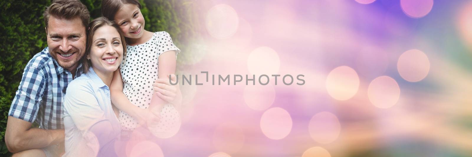 Digital composite of Family smiling with purple bokeh transition