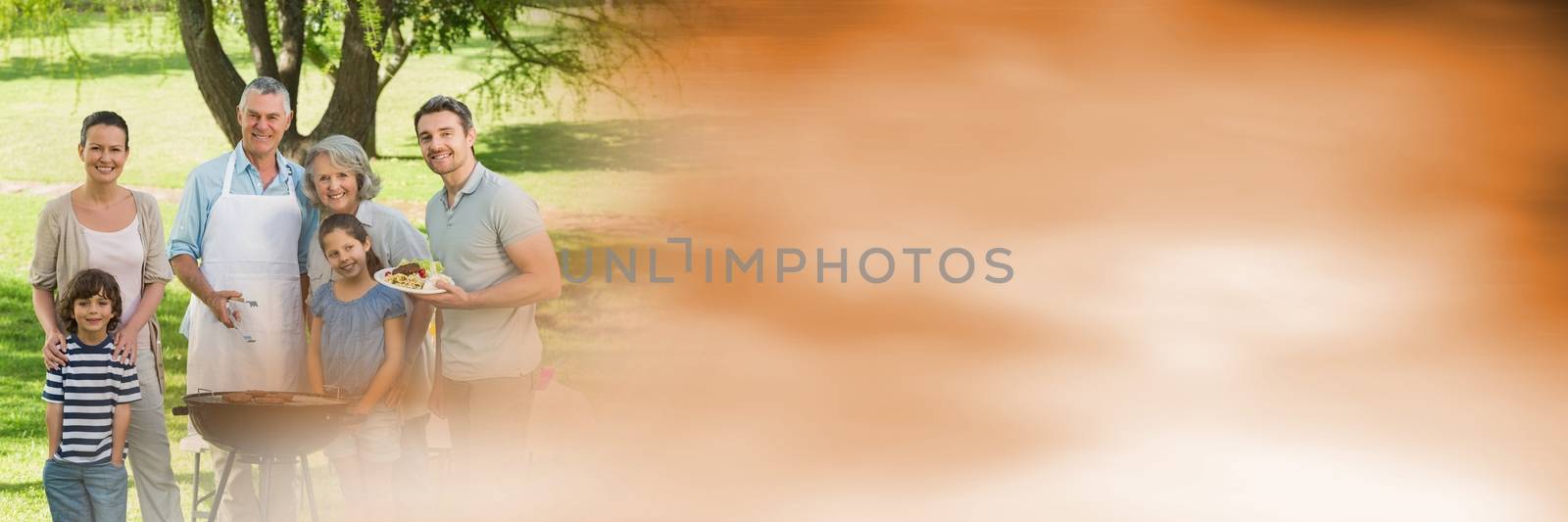 Digital composite of Family at bbq with blurry orange transition