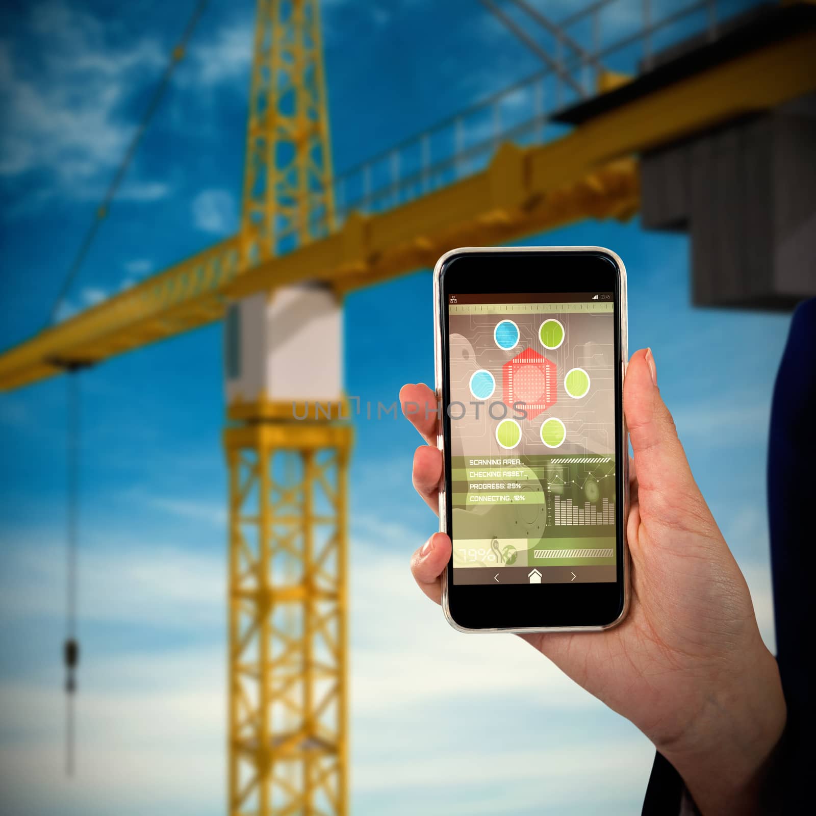 Mid section of businesswoman holding mobile phone against low angle 3d image of yellow crane