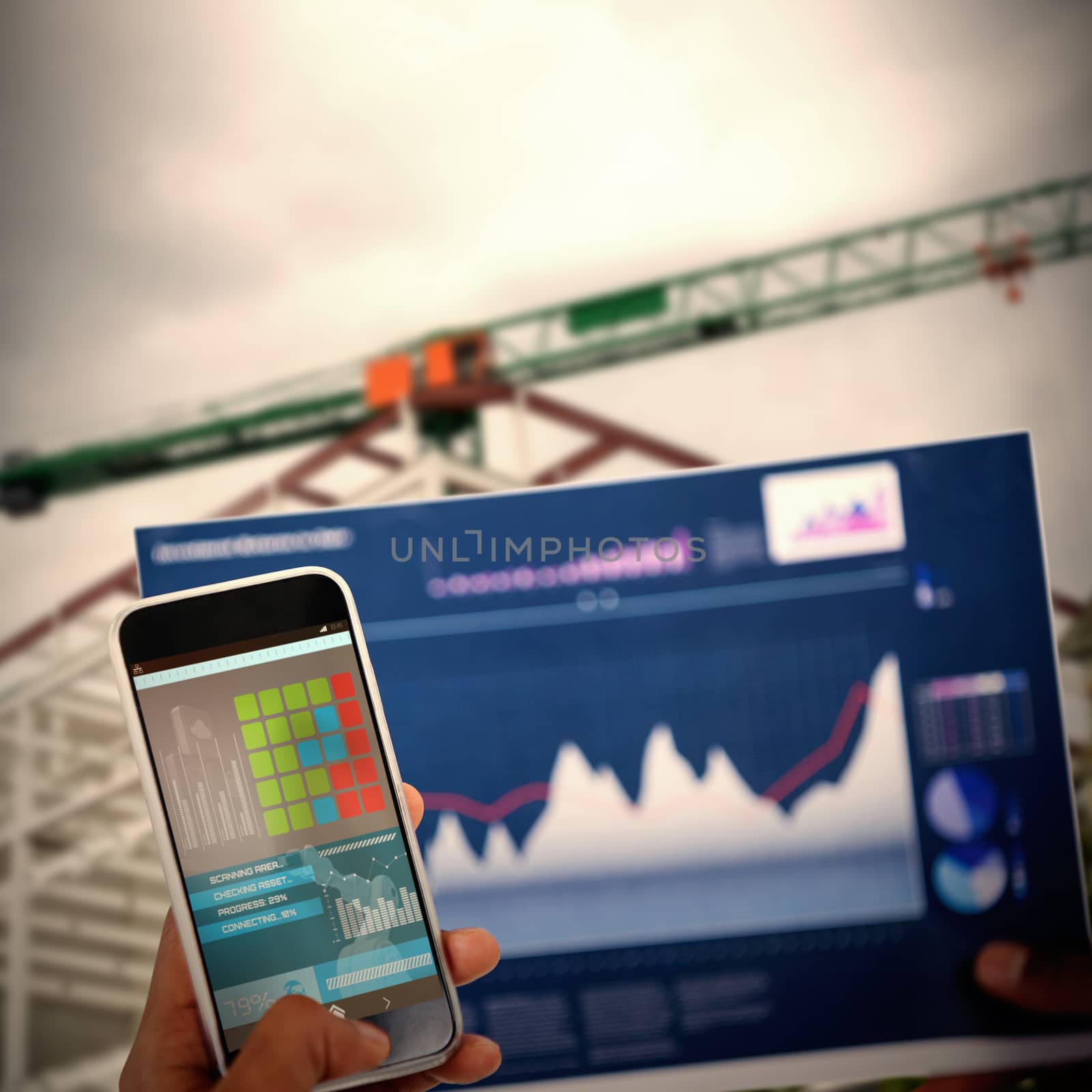 Cropped image of hand holding mobile phone and graph against 3d image of cranes at construction site