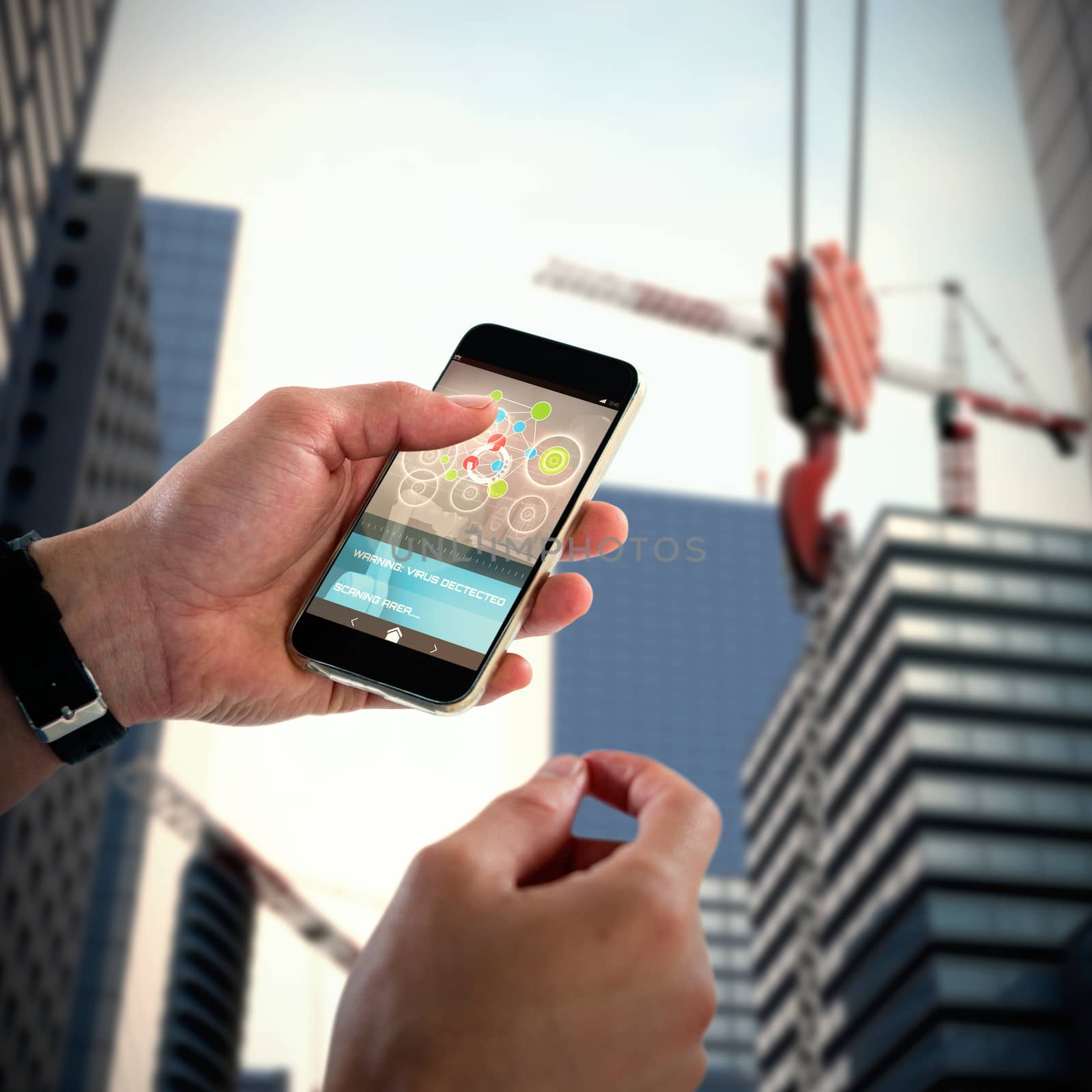 Close-up of man holding 3D mobile phone against composite image of studio shoot of a crane 