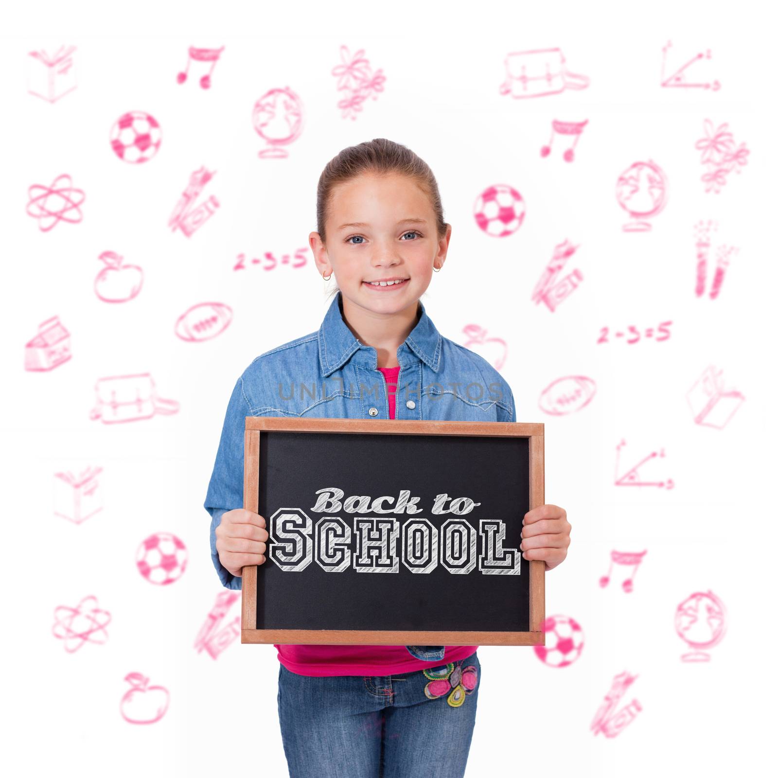 Back to school message against cute pupil showing chalkboard