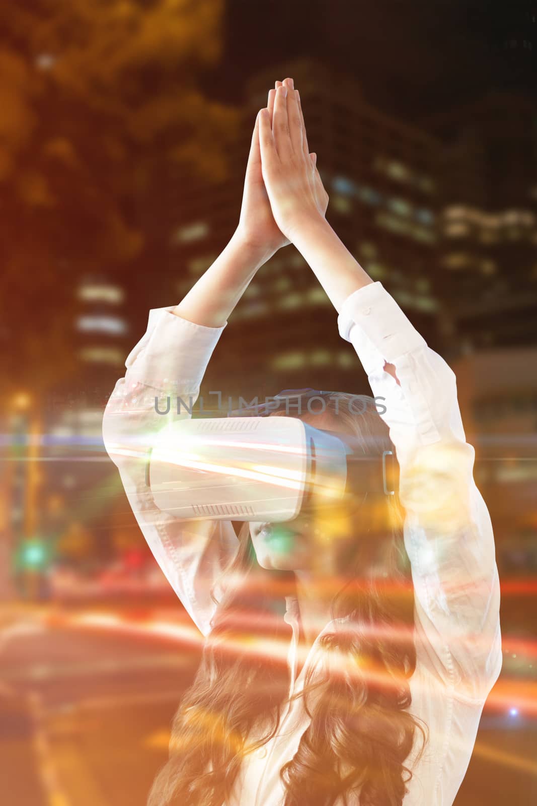 Composite image of young woman practicing yoga while wearing virtual reality glasses by Wavebreakmedia