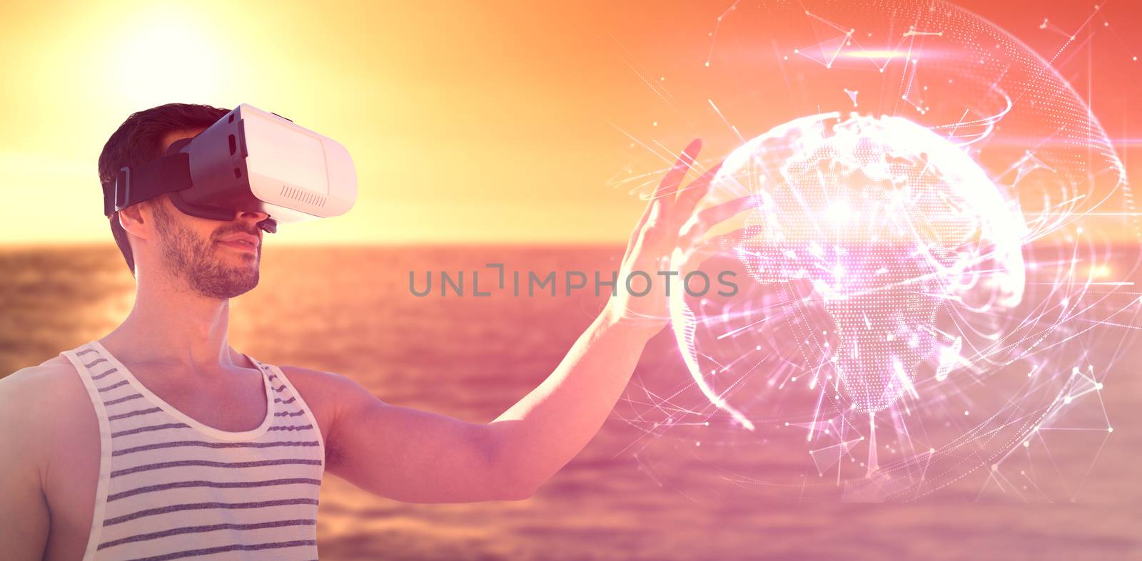 Composite image of young man using virtual reality glasses by Wavebreakmedia