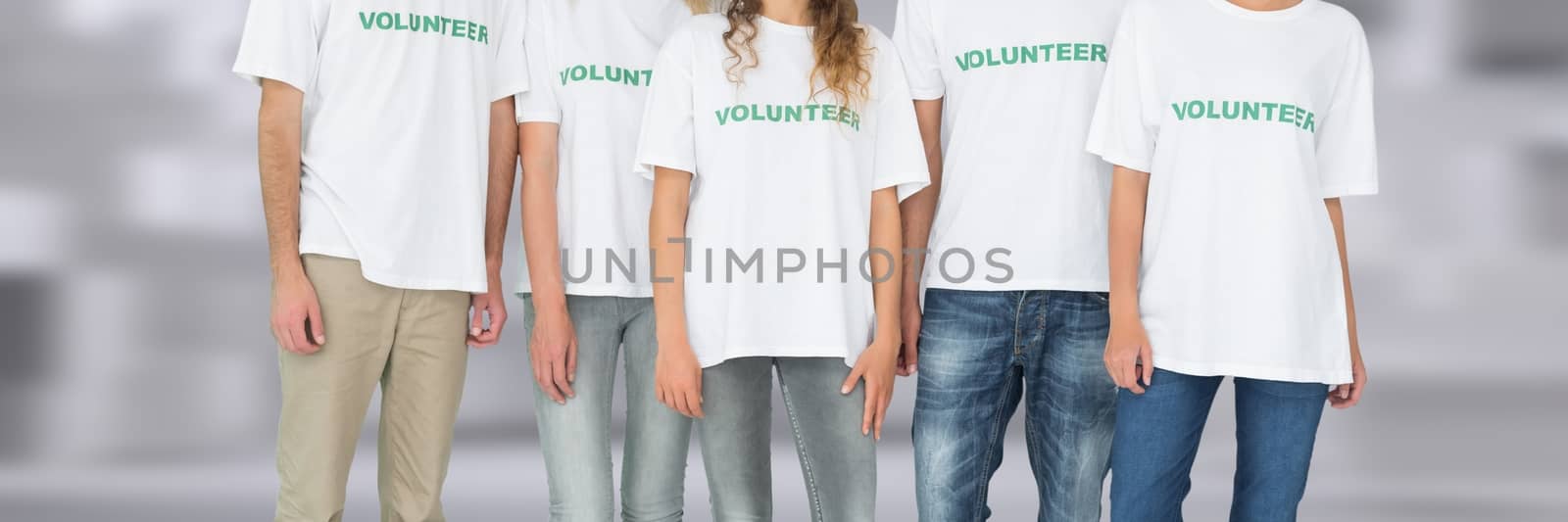 Digital composite of Group of Volunteer People standing together with blurred background