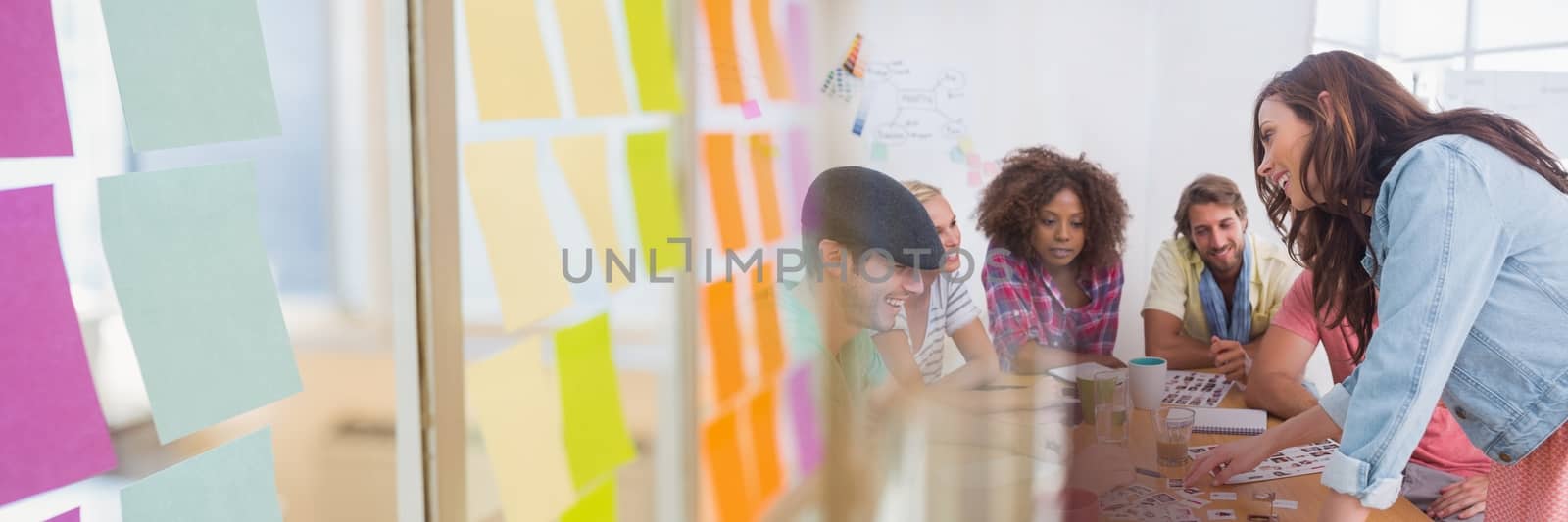 Digital composite of Business people having a meeting with colorful sticky notes transition effect