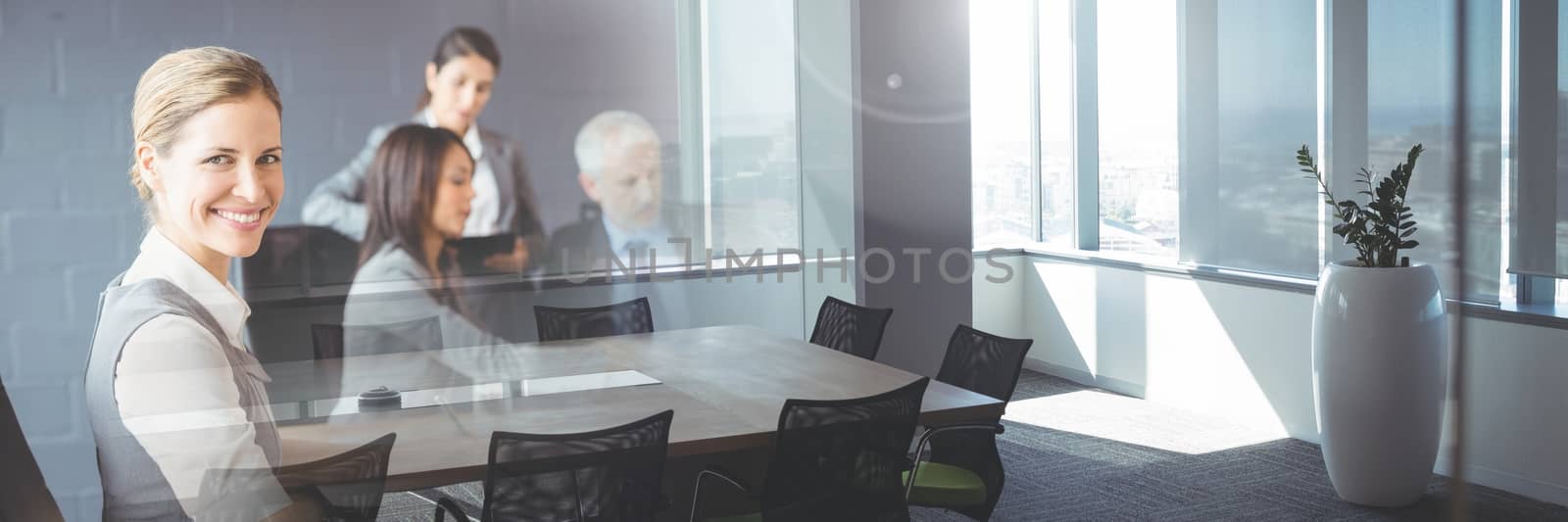 Business people having a meeting with office transition effect by Wavebreakmedia