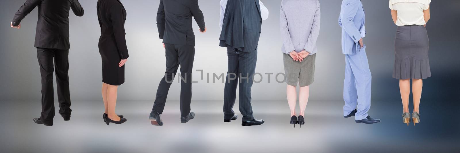 Group of Business People standing with moody background by Wavebreakmedia