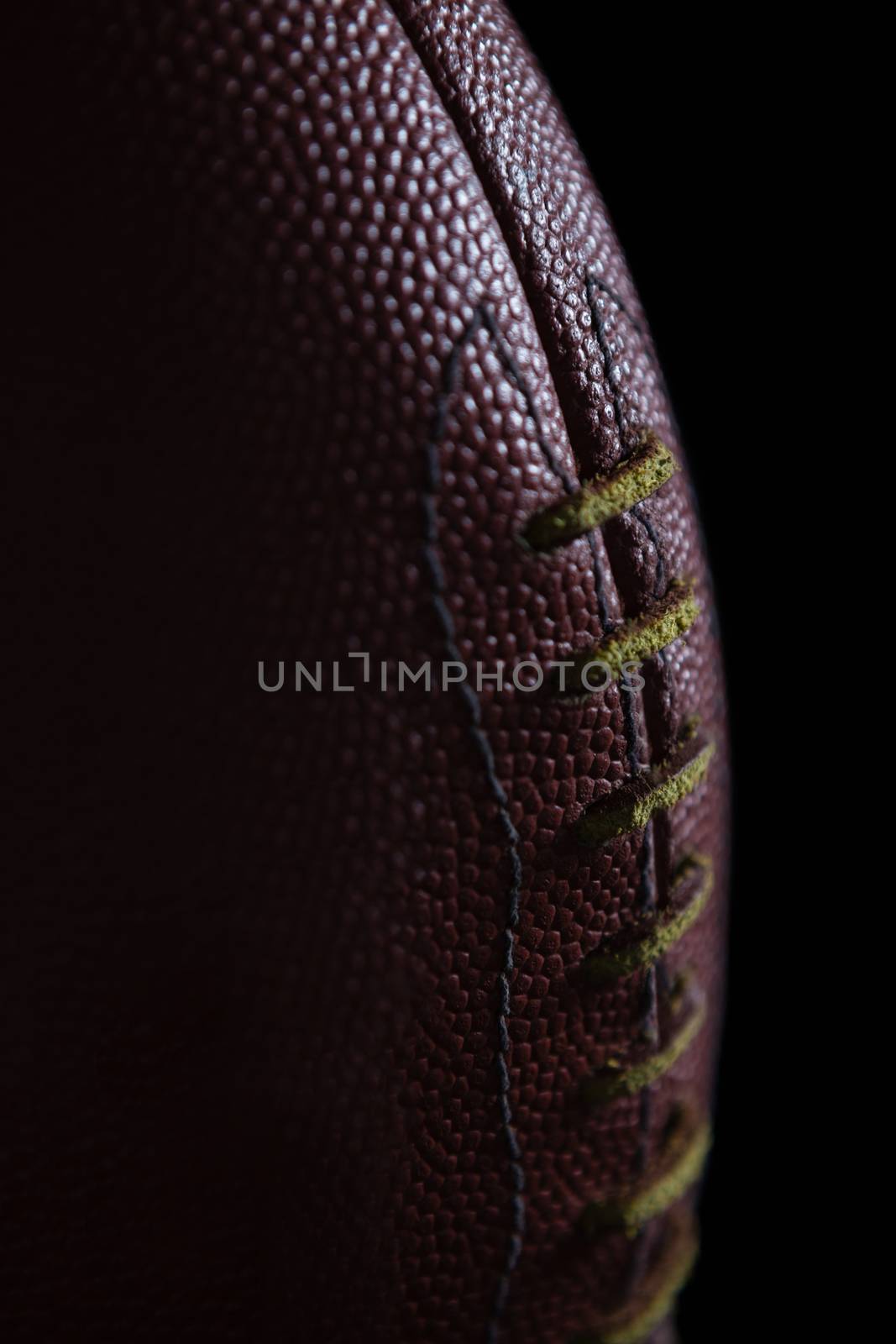 Close-up of texture and stitch on American football by Wavebreakmedia