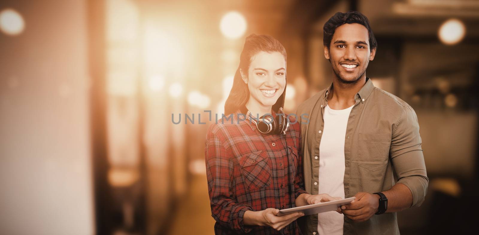 Composite image of portrait of people posing with digital tablet  by Wavebreakmedia