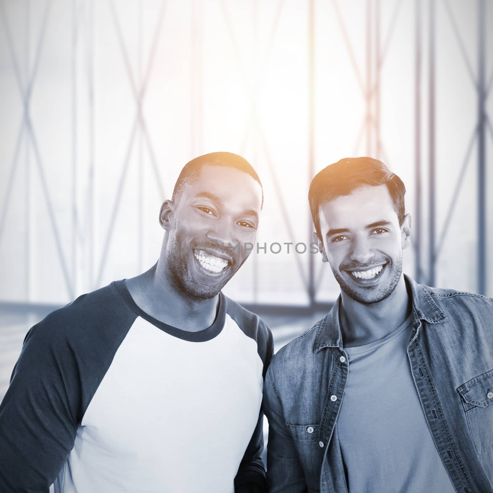 Smiling businessmen looking at camera against white room with large window overlooking city