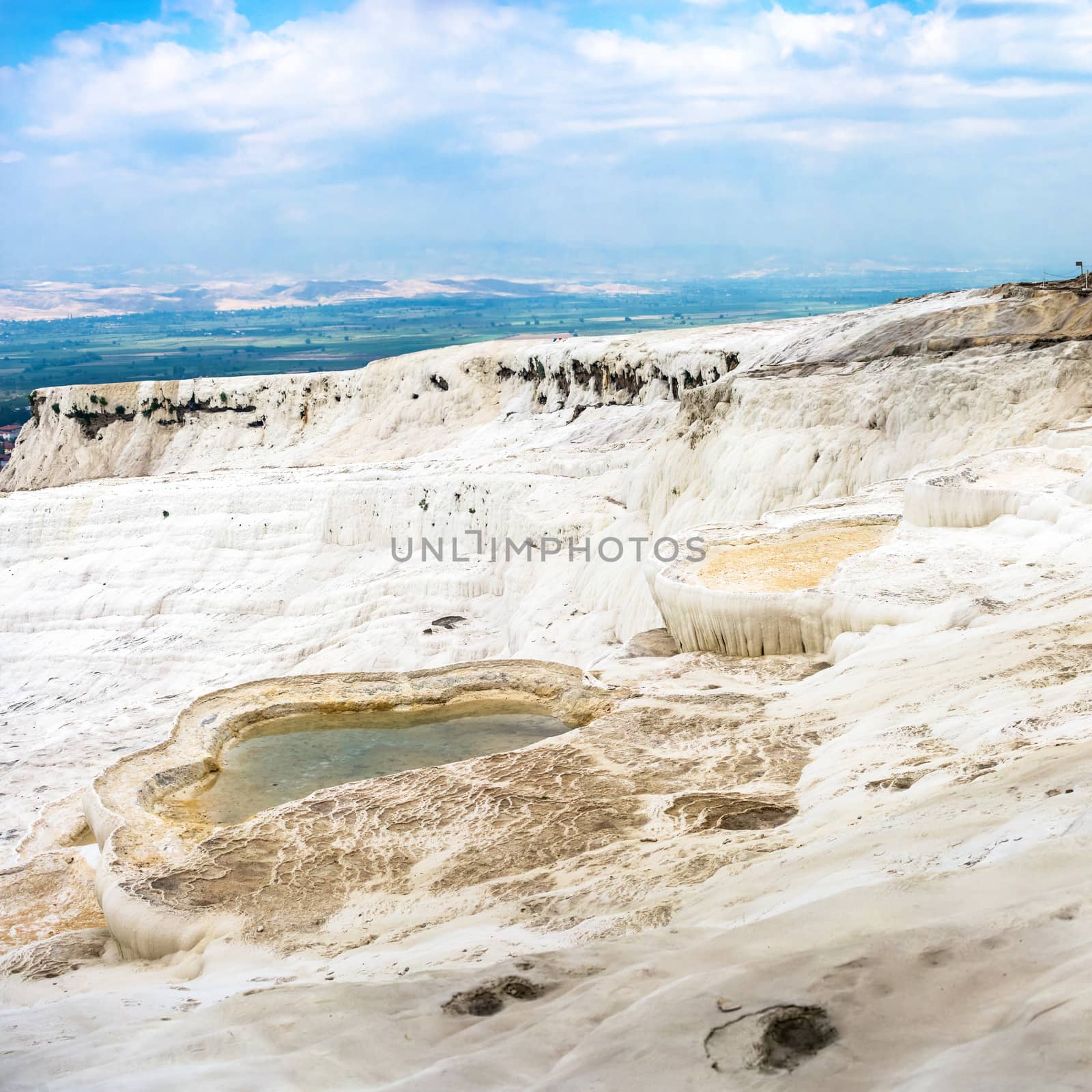 Pamukkale Travertine pool in Turkey on a summer morning.