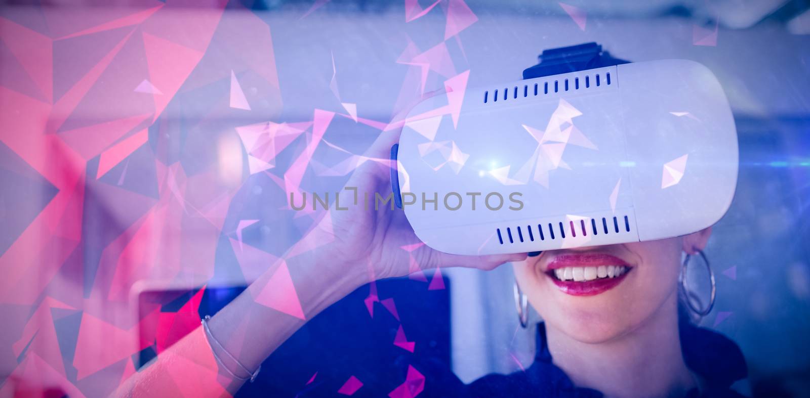 Dark abstract design against businesswoman using virtual reality simulator