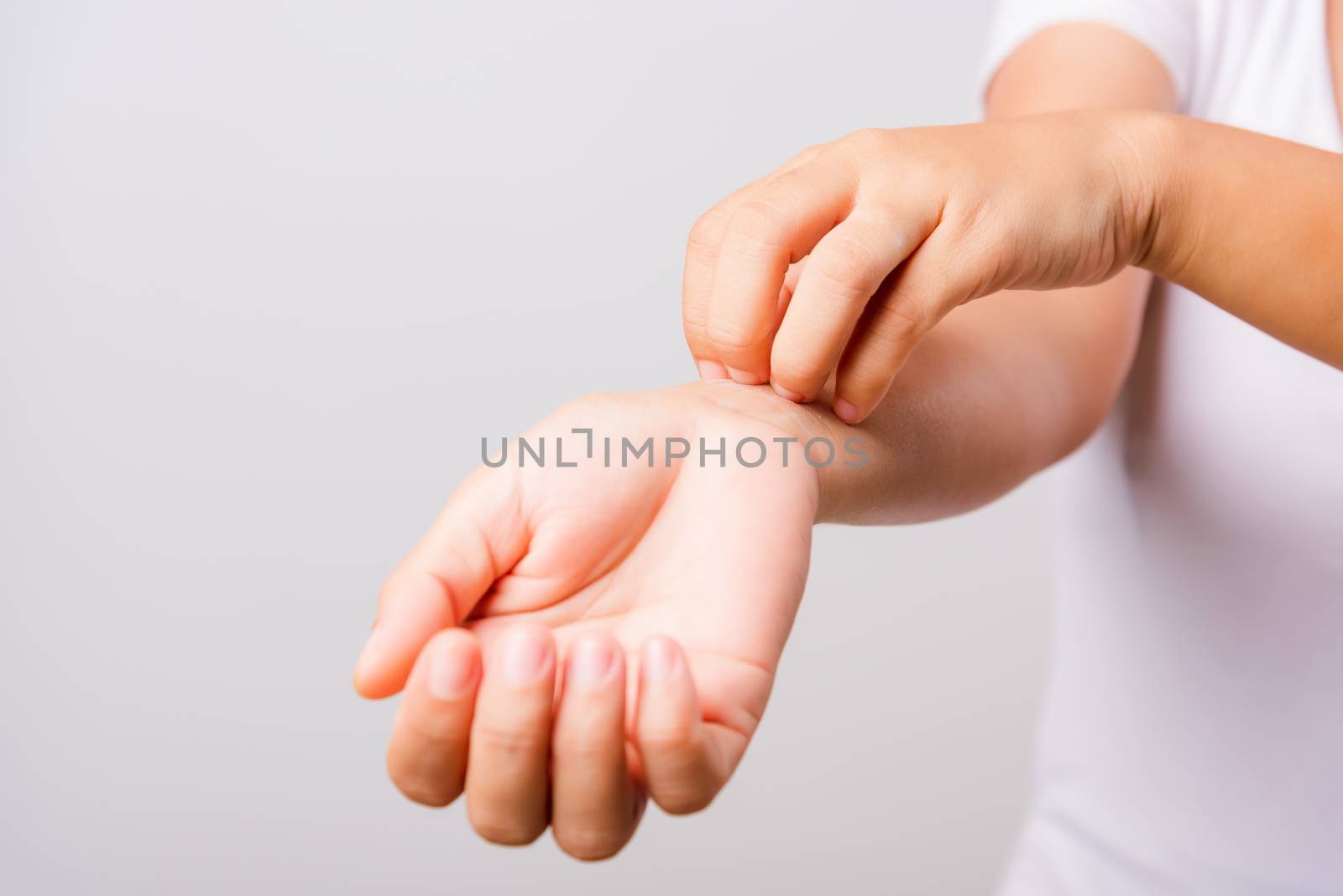 Asian beautiful woman itching her useing hand scratch itch hand on white background with copy space, Medical and Healthcare concept