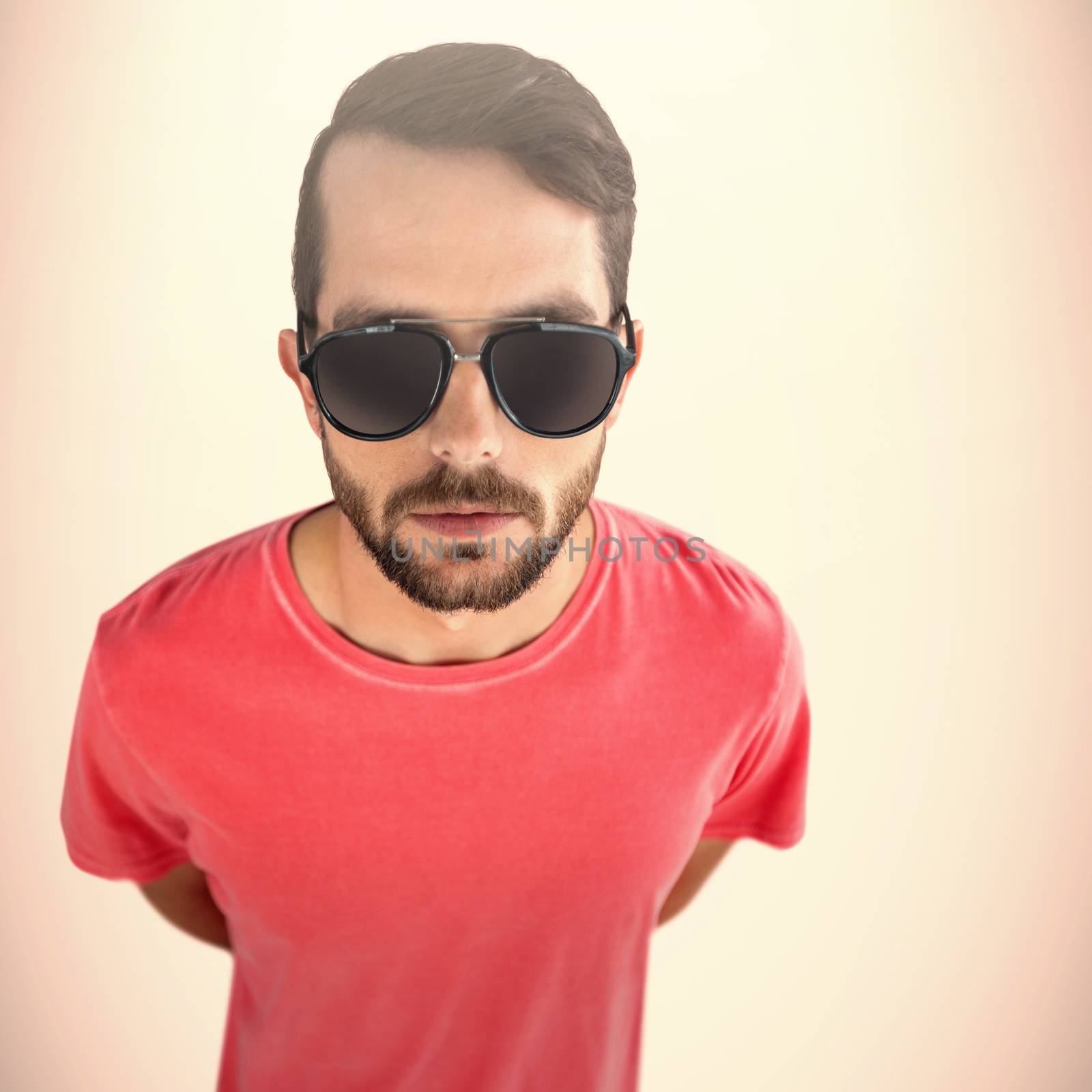 Male model in sunglasses against white background against neutral background 