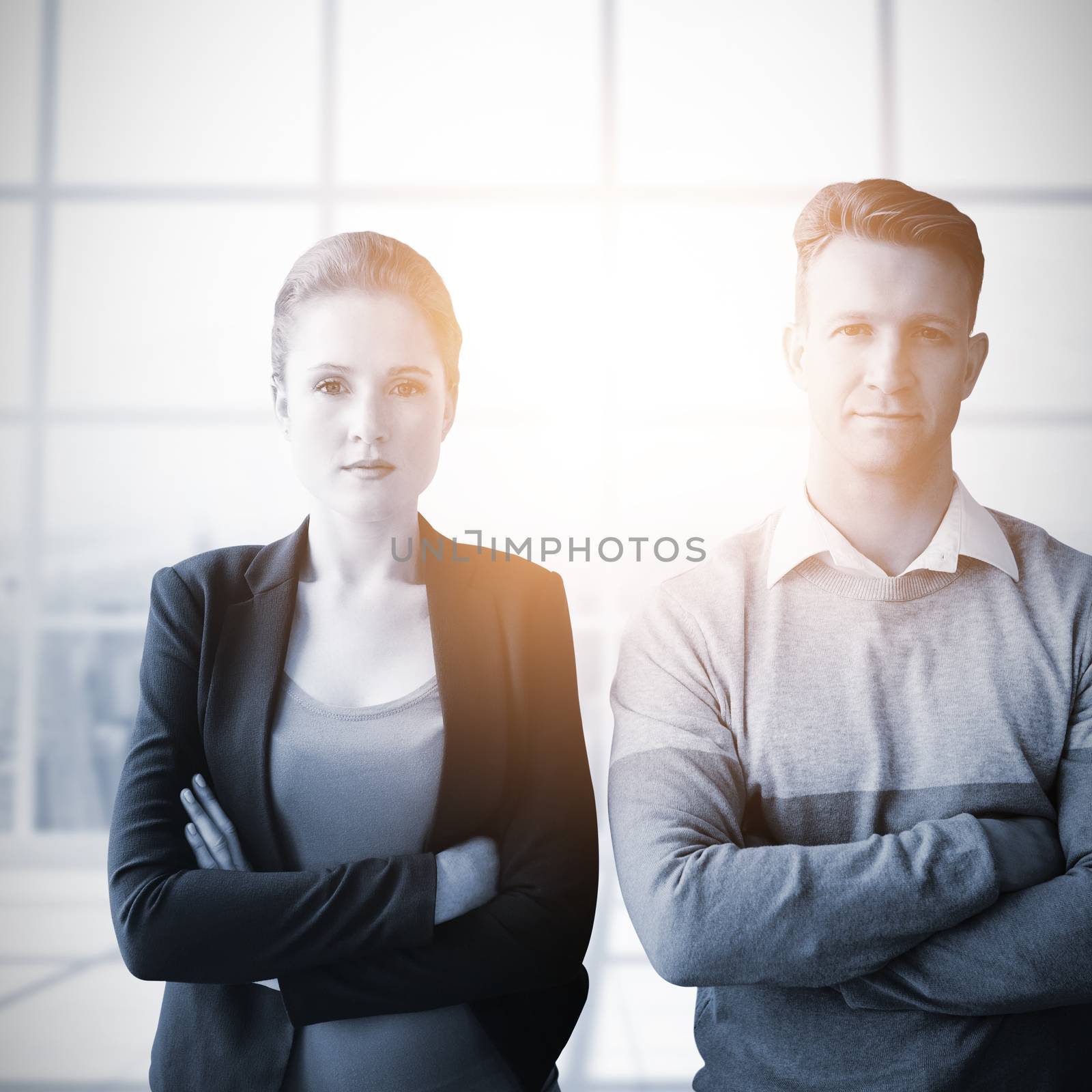 Business people looking at camera against view of a city