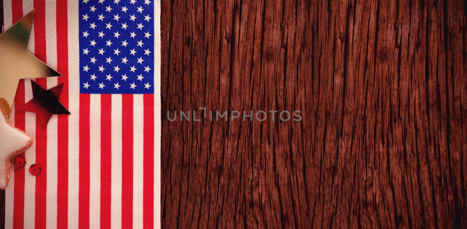 American flag and star shape decoration arranged on wooden table with 4th July theme