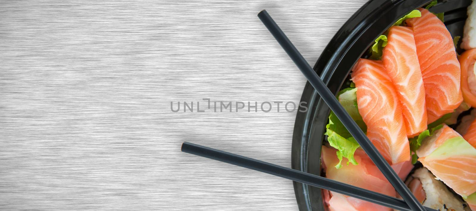 Salmon with vegetable in bowl against white background against grey texture background