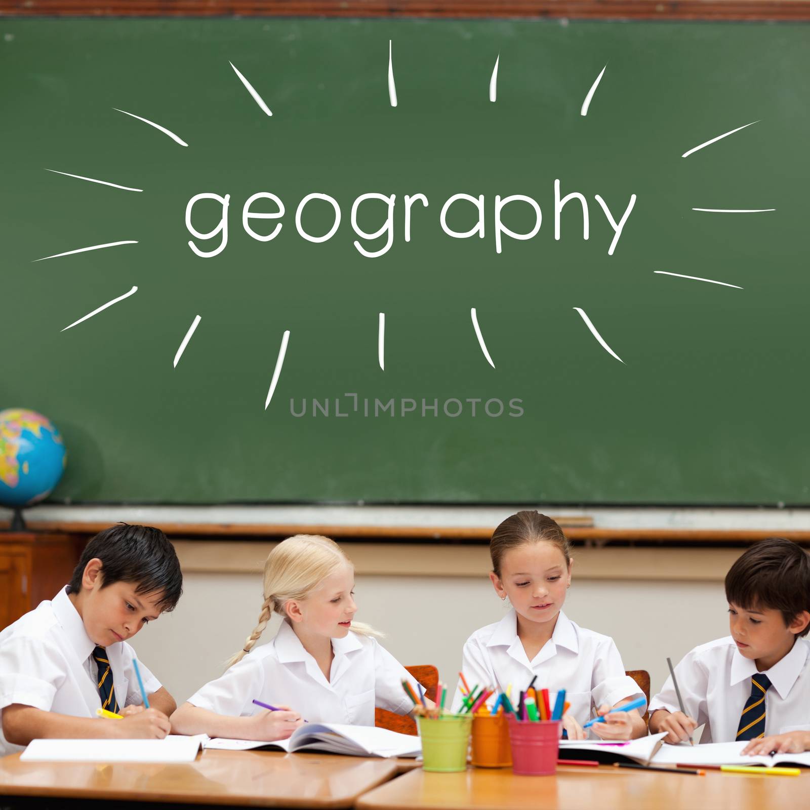 The word geography against cute pupils sitting at desk