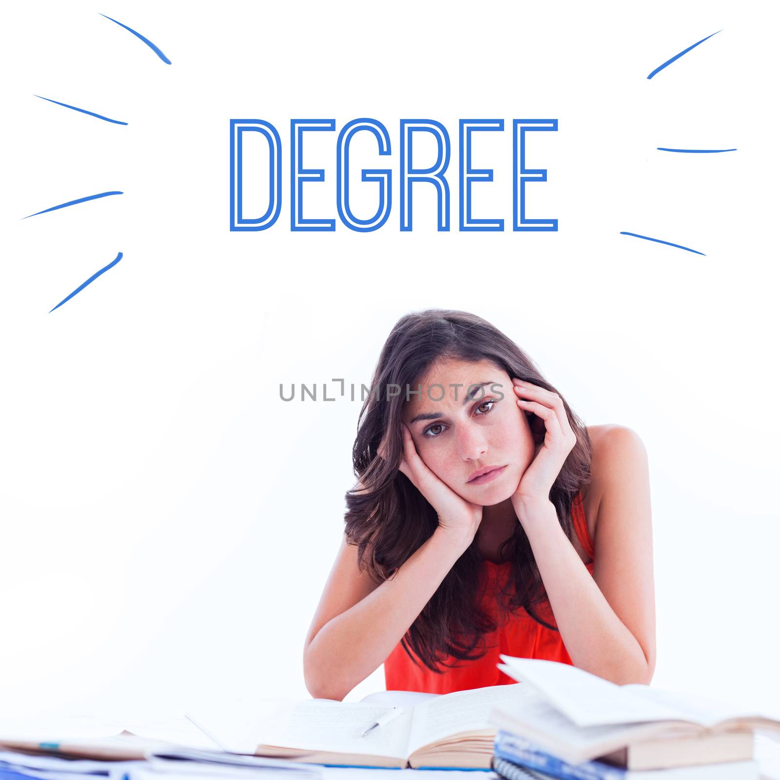 The word degree against stressed student at desk