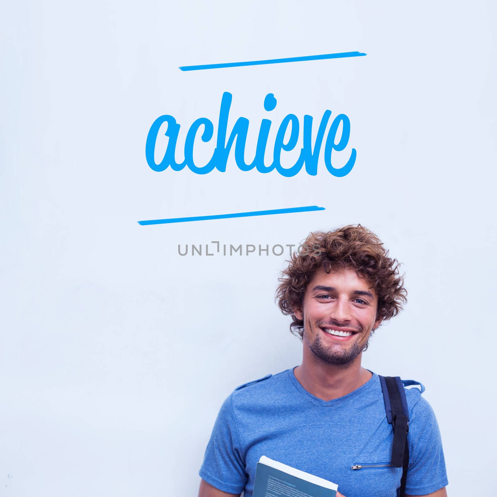 Achieve against happy student holding book by Wavebreakmedia