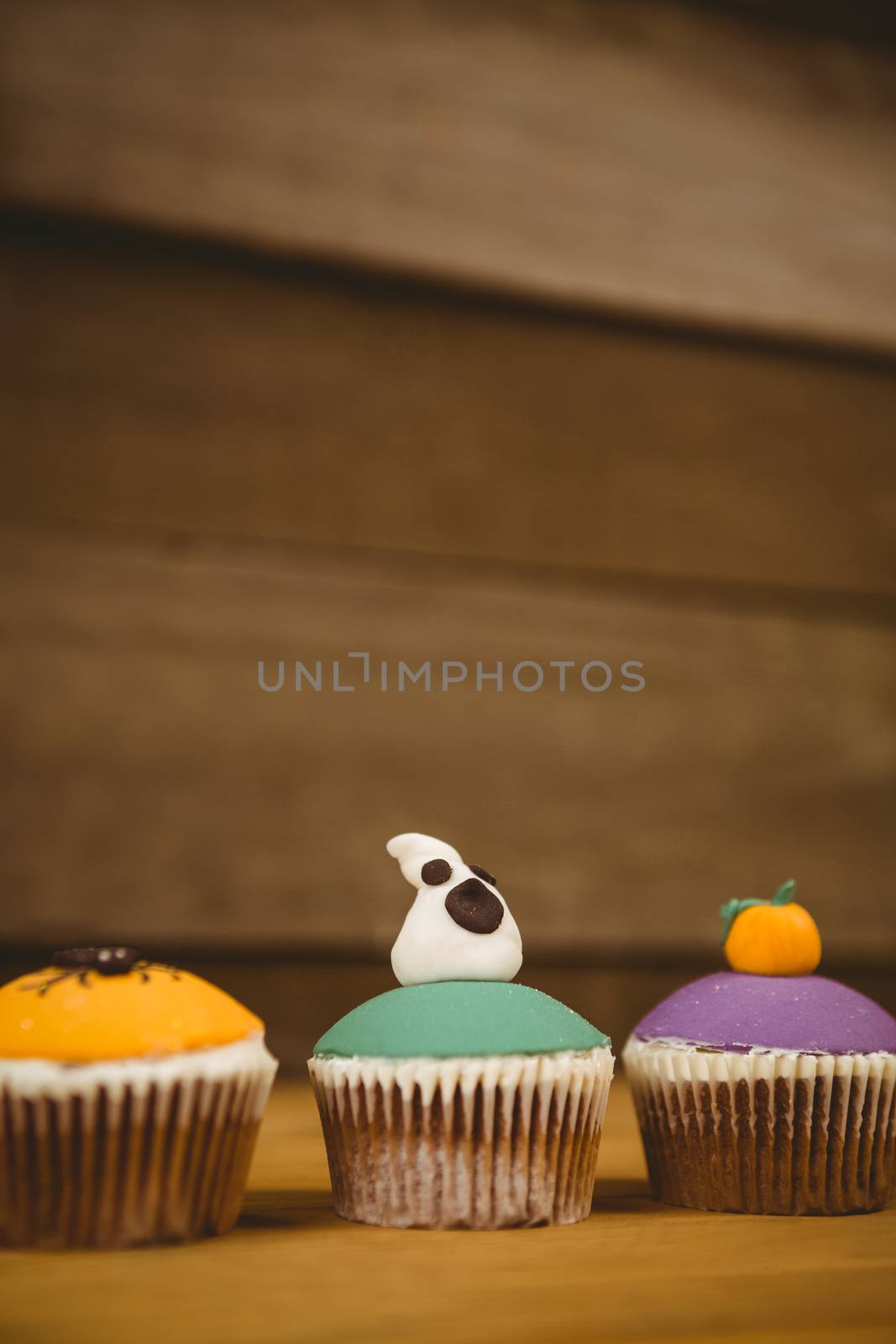 Close up of various sweet food arranged on table during Halloween