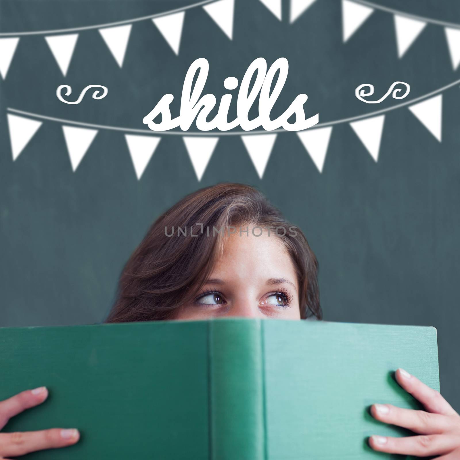 The word skills and bunting against student holding book