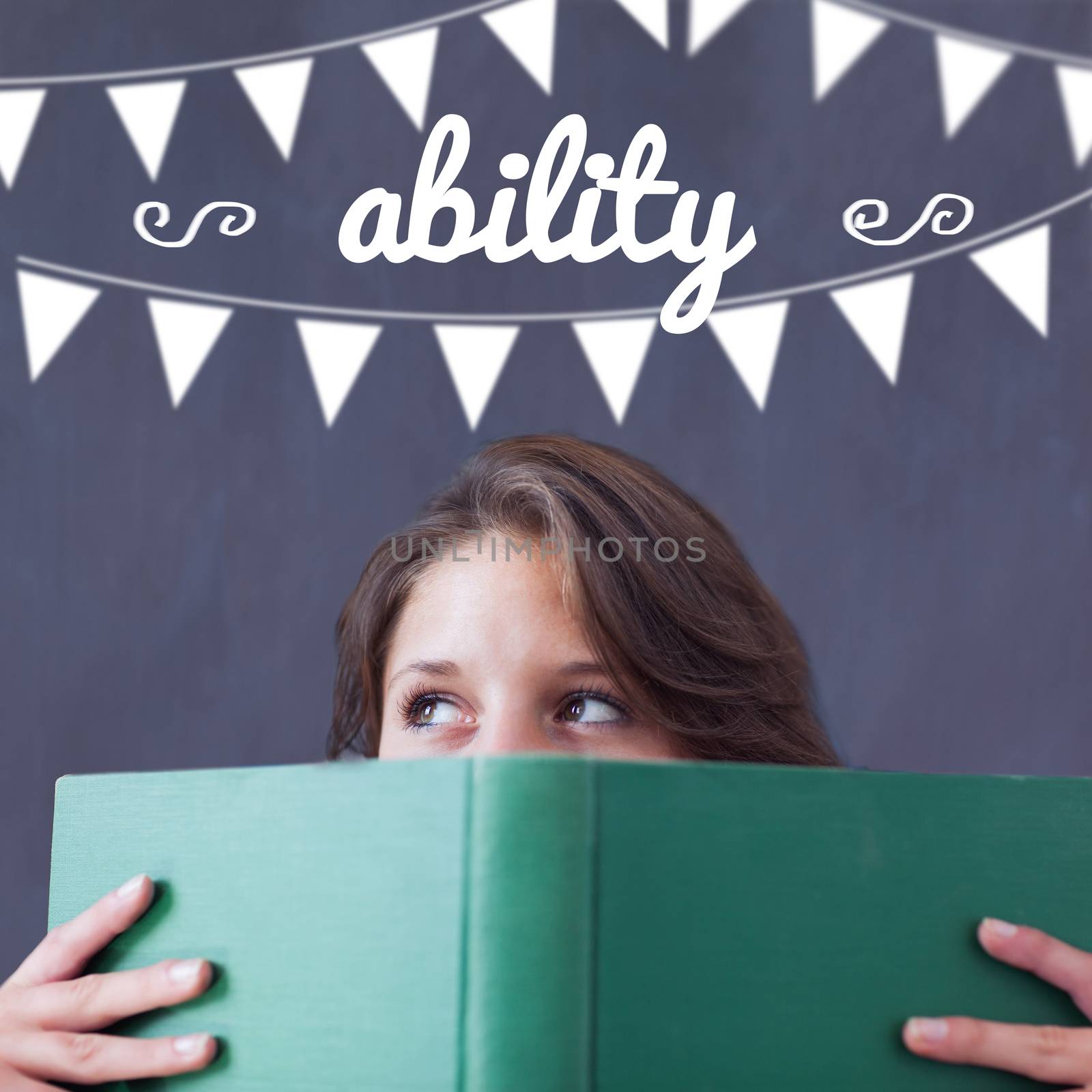 The word ability and bunting against student holding book