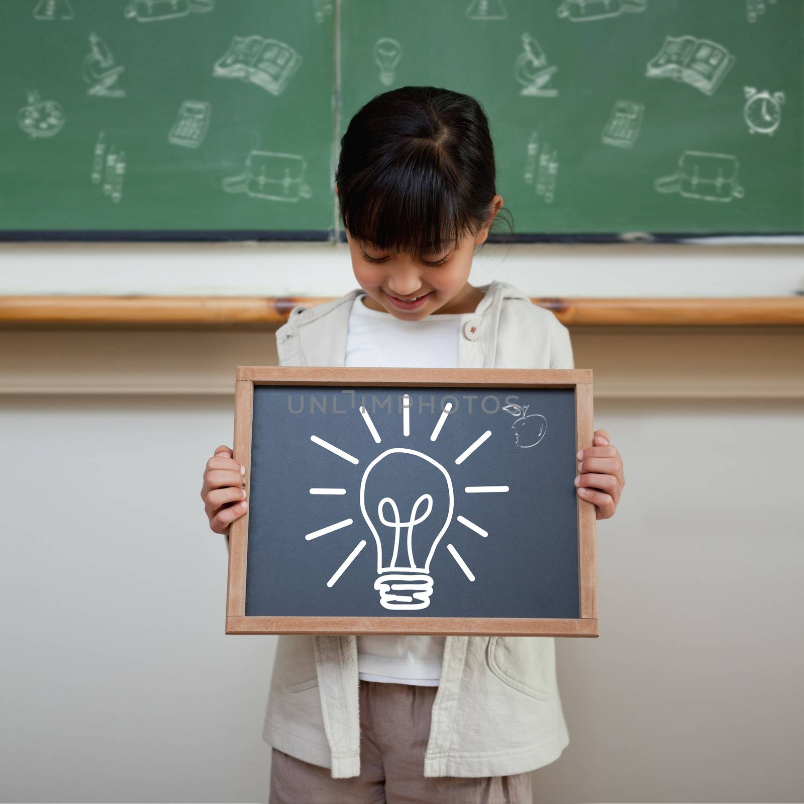 Idea and innovation graphic against cute pupil showing chalkboard