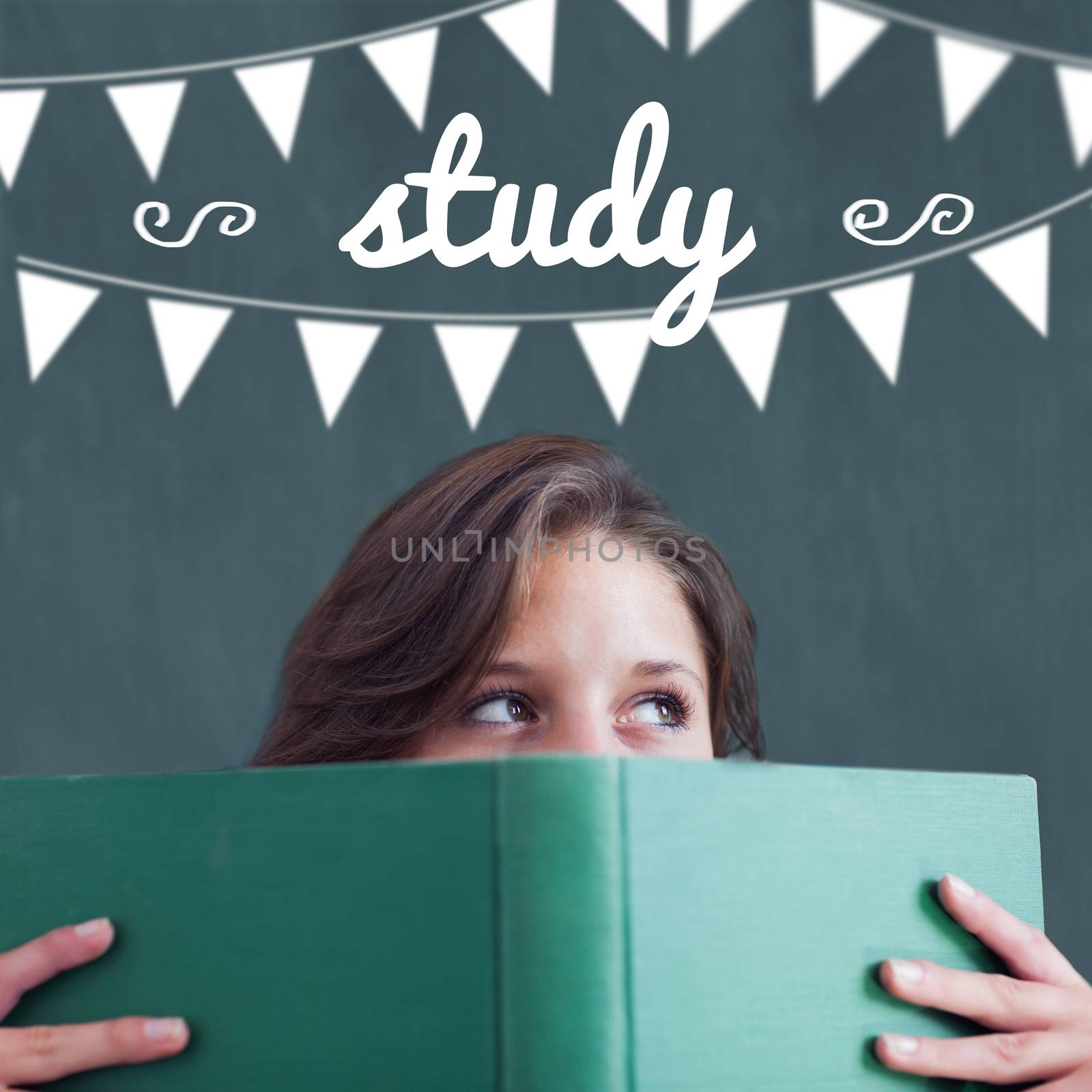 Study against student holding book by Wavebreakmedia
