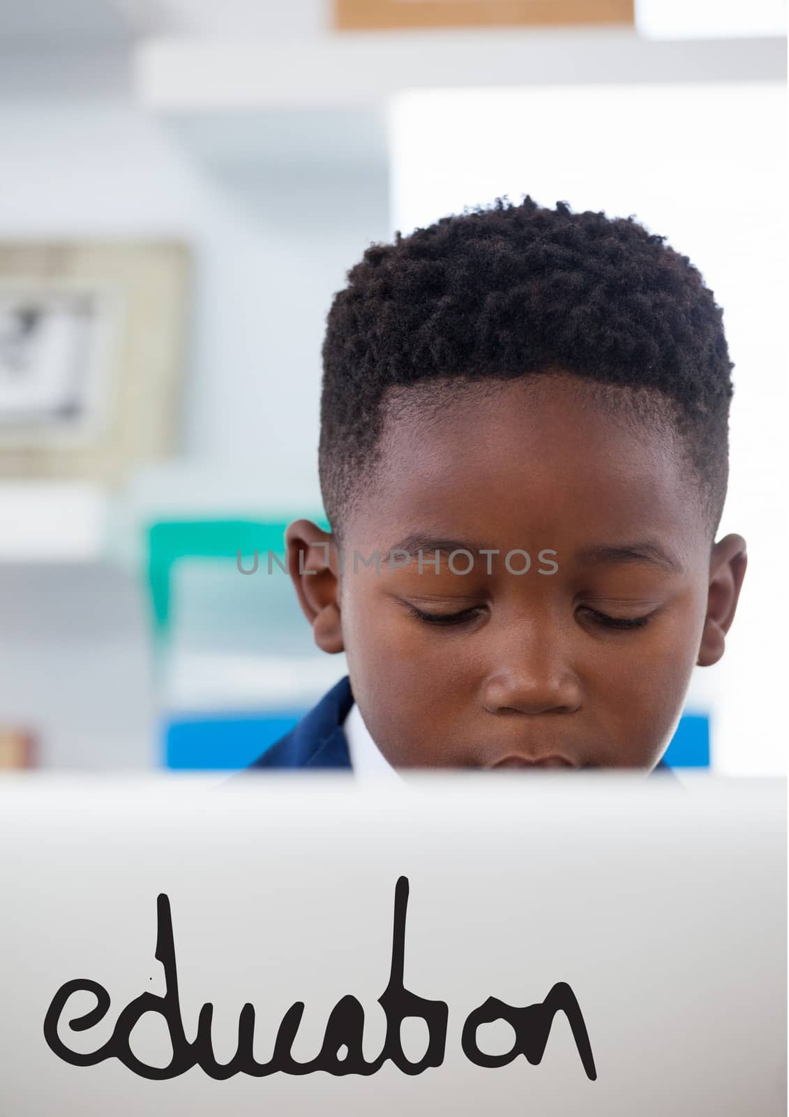 Education text against office kid boy using a computer background by Wavebreakmedia