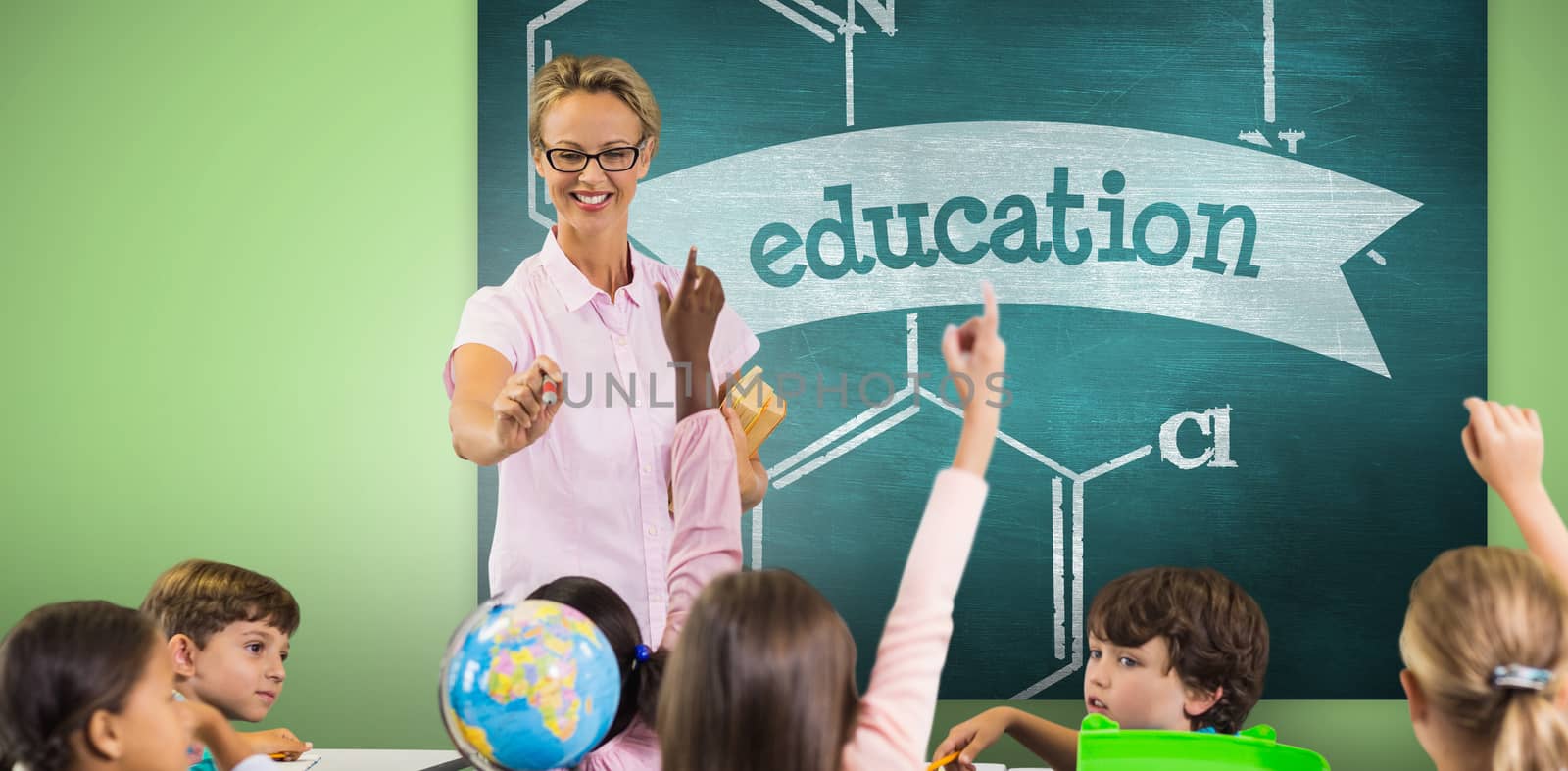 Students raising hands while teacher teaching against education against green chalkboard