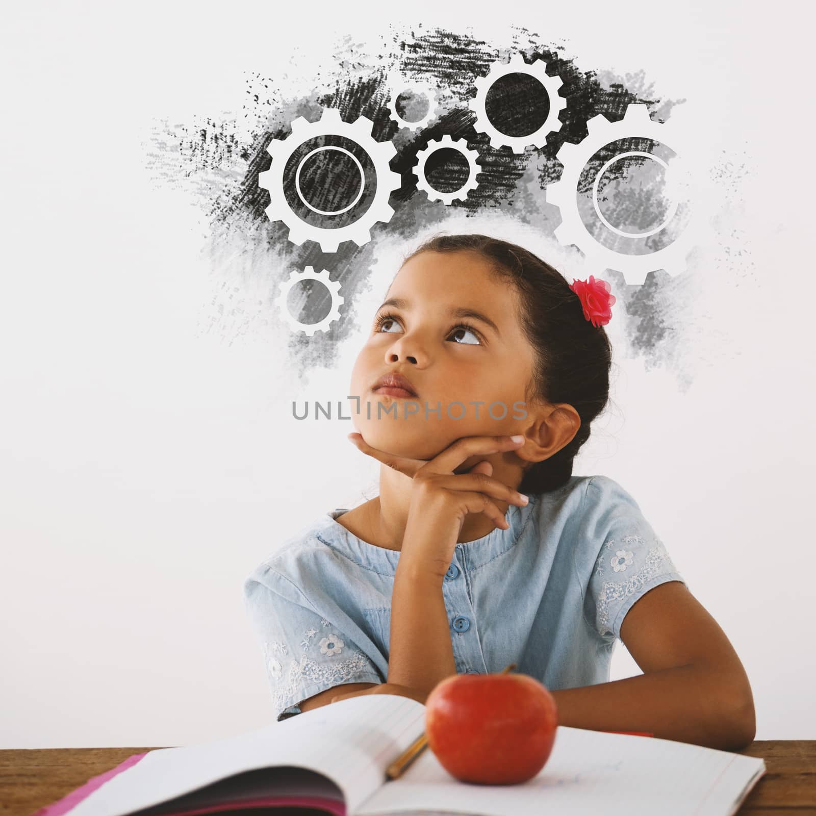 Digital composite image of gears on black spray paint against thoughtful young girl sitting