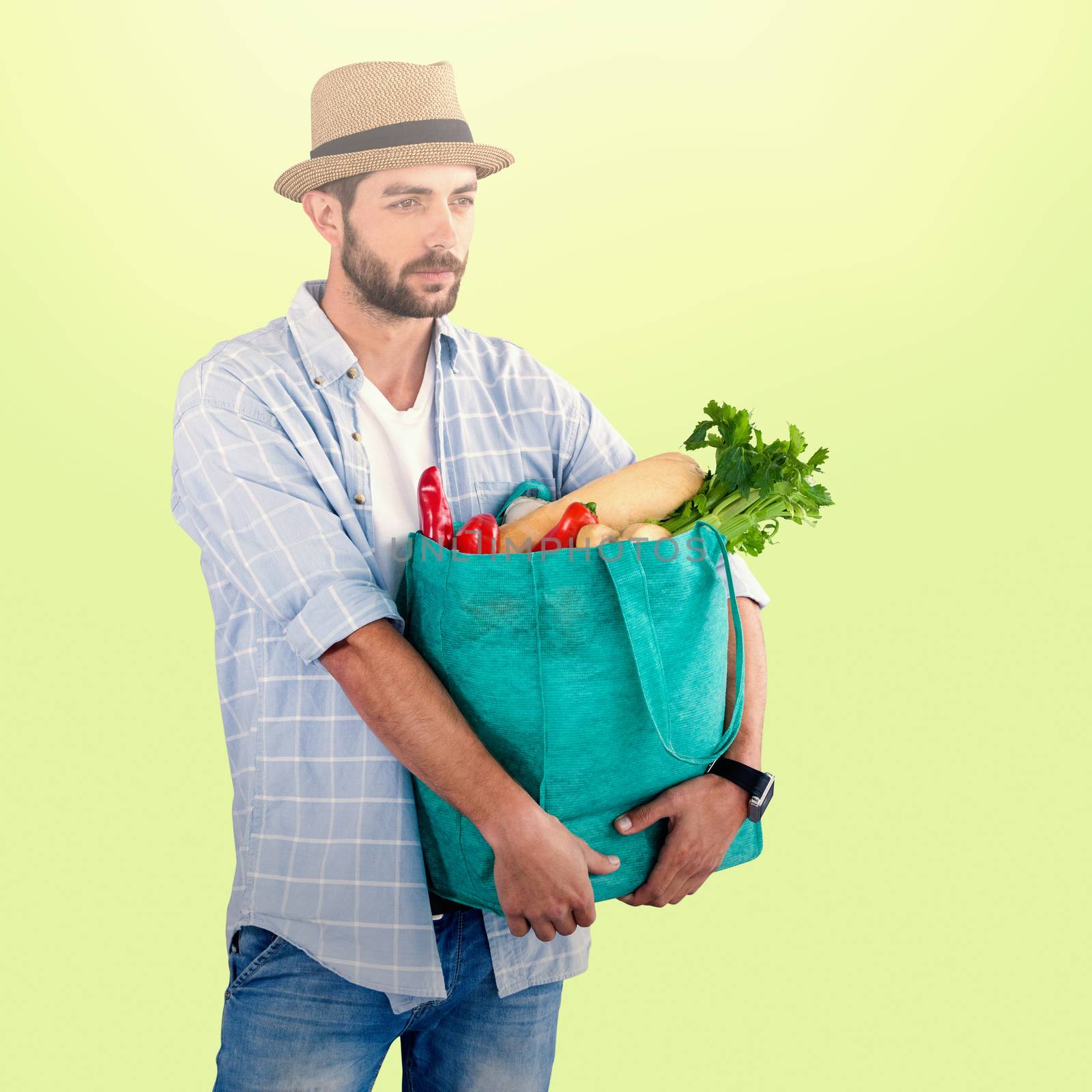 Composite image of man carrying vegetables in shopping bag against white background by Wavebreakmedia