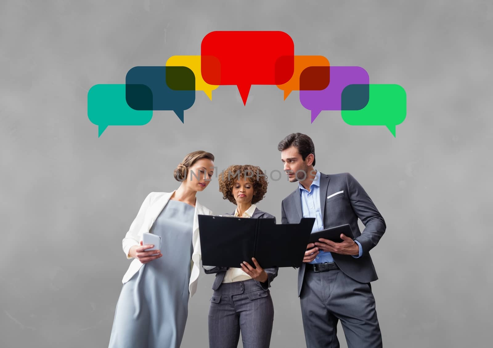 Business people with speech bubbles against grey background by Wavebreakmedia