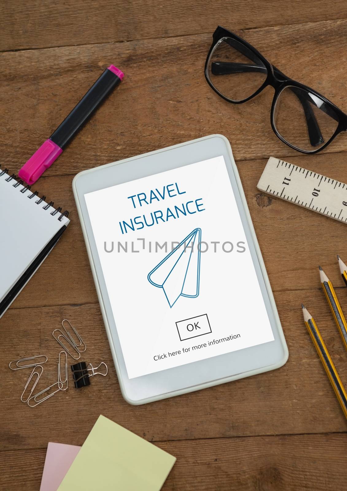 Digital composite of Tablet with travel insurance concept on screen