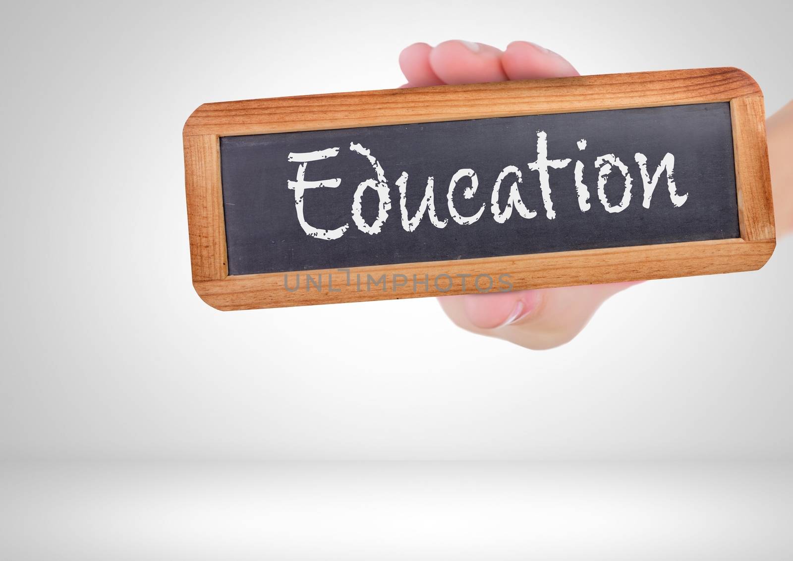 Education text on blackboard by Wavebreakmedia